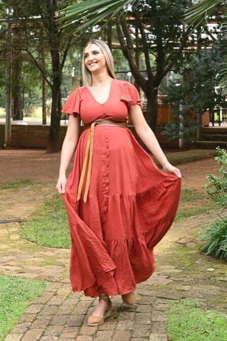 Rust button-up maternity and nursing dress with layered ruffle skirt and frilly sleeves