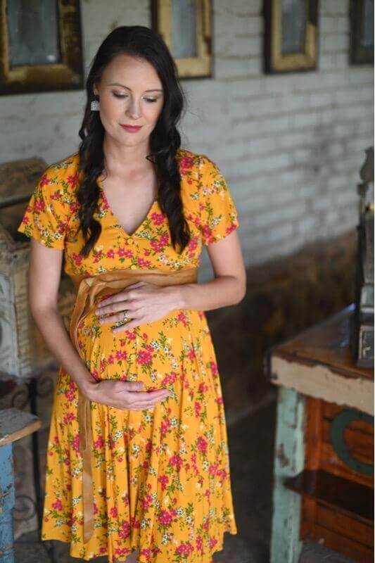 Mustard and pink floral viscose maternity dress with short sleeves and button up front