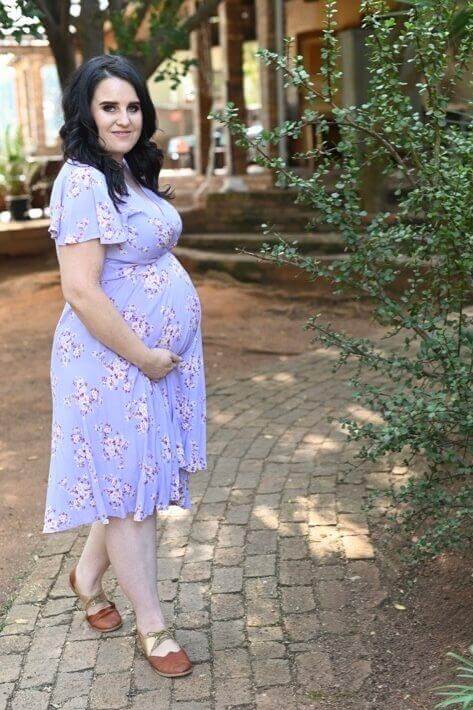 Lilac floral wrap maternity and nursing dress with frilly sleeves and short viscose silhouette