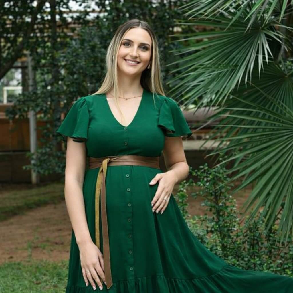 Forest green button-up maternity and nursing dress with layered ruffle skirt and frilly sleeves