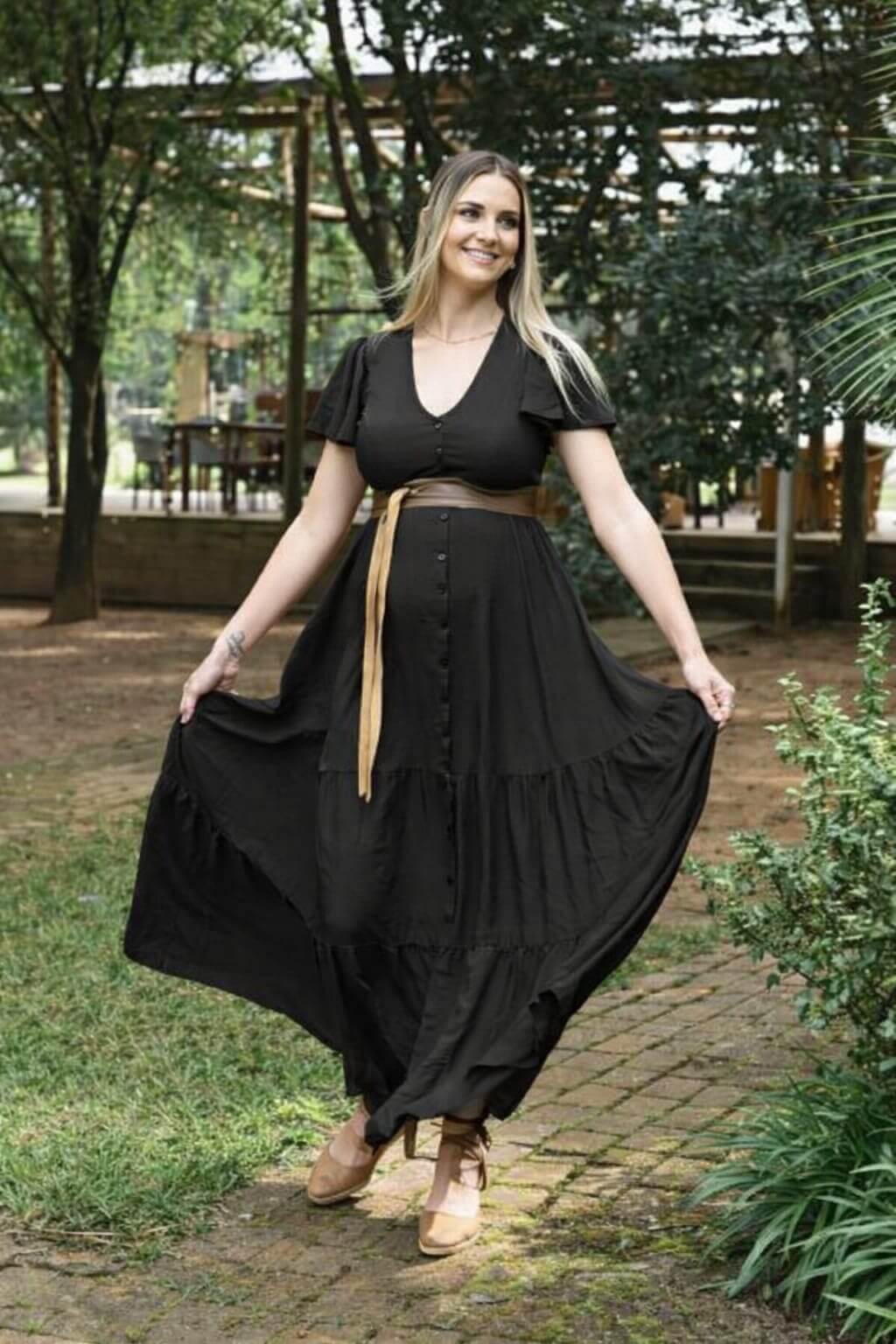 Black button-up maternity and nursing dress with layered ruffle skirt and frilly sleeves