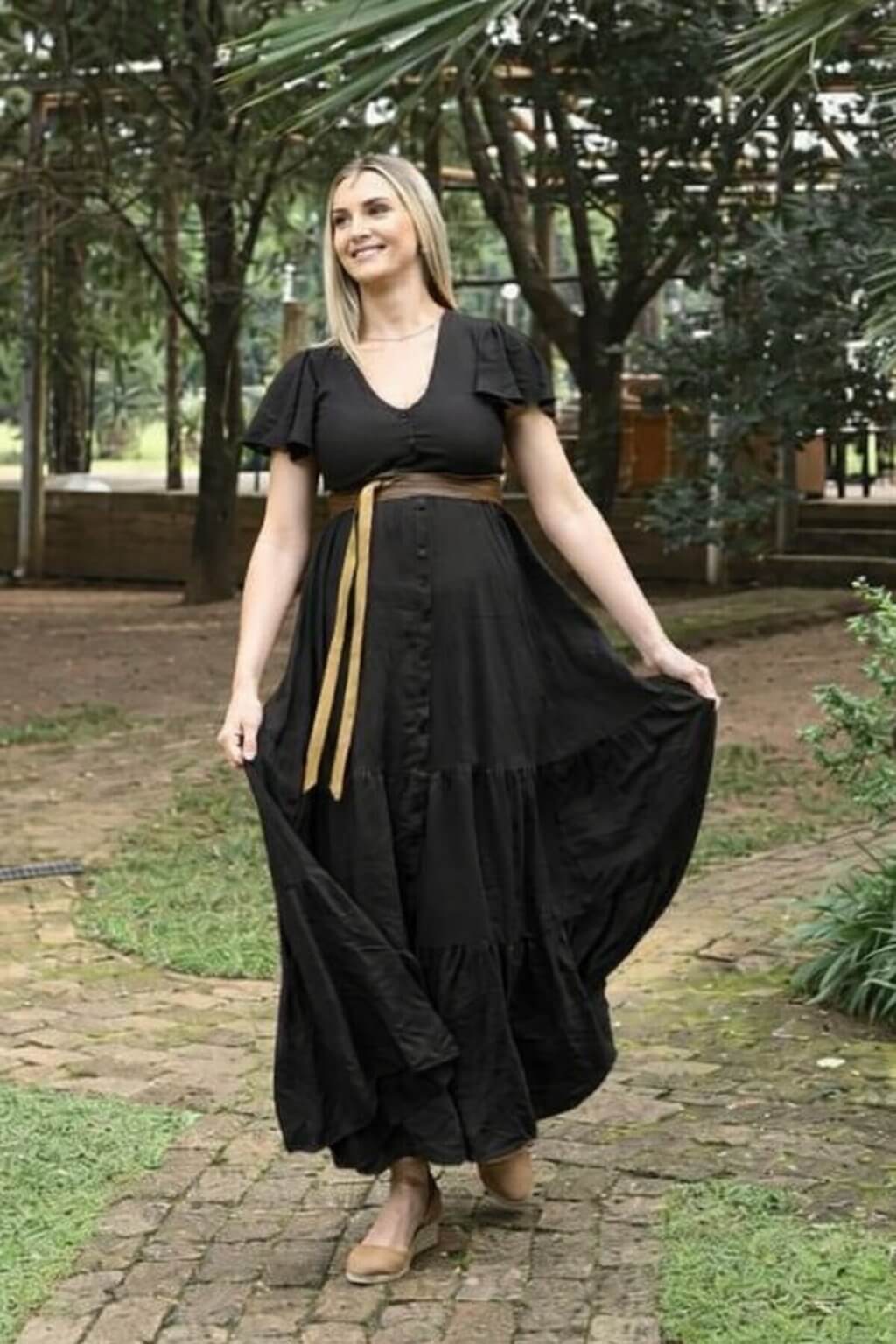 Black button-up maternity and nursing dress with layered ruffle skirt and frilly sleeves