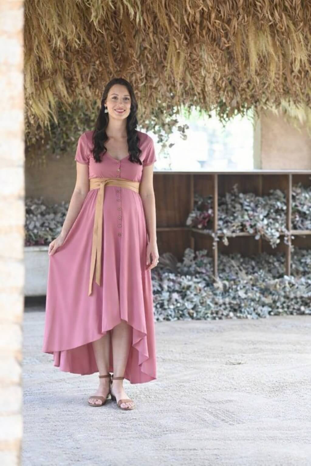 Rose pink maternity and nursing dress with button-up front, short sleeves, and hi-low silhouette