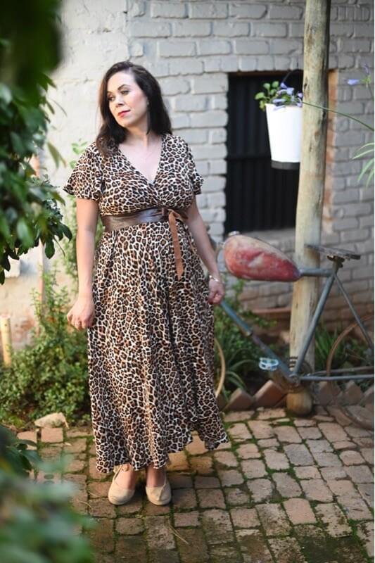 Leopard print wrap maternity and nursing dress with short sleeves and hi-low silhouette