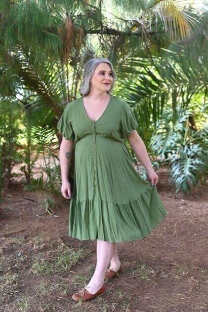 Olive viscose maternity and nursing dress with button-up front, frill skirt, and poofy sleeves