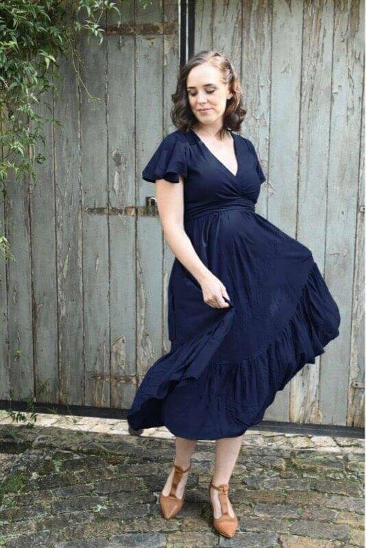 Navy blue infinity maternity dress with frilly sleeves, nursing friendly and postpartum ready