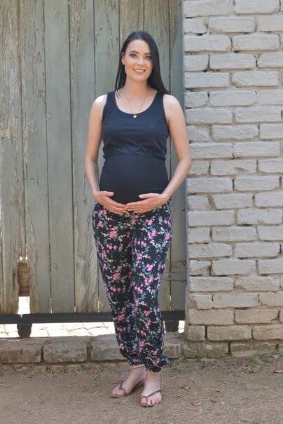 Black and pink floral maternity pants with belly band