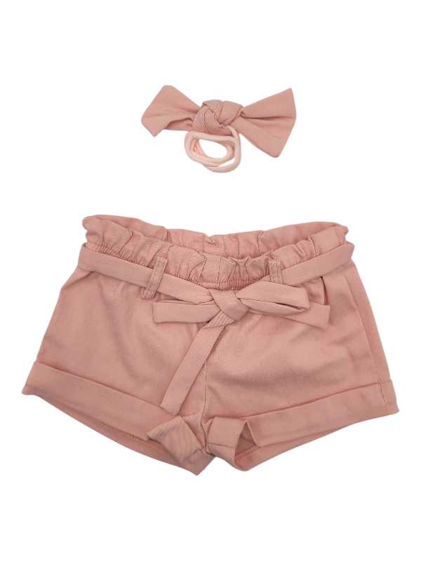 Coral pink short paperbag pants with matching belt and headband made from Bengaline fabric