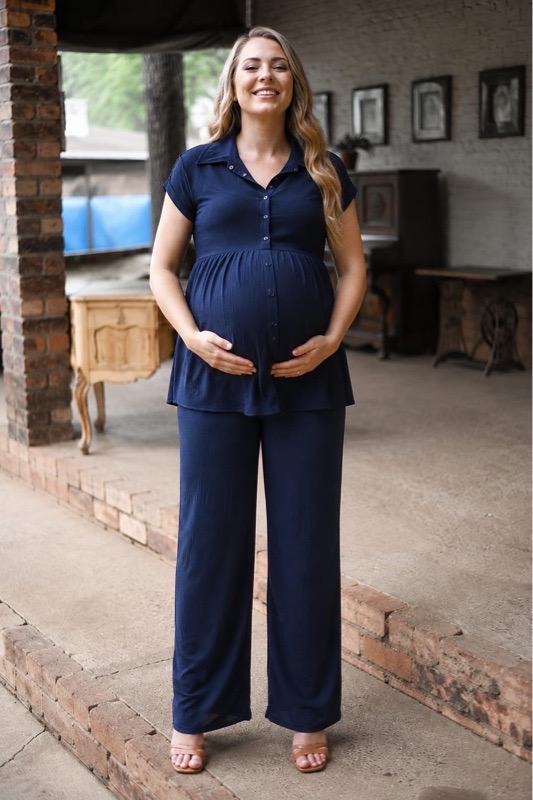 Navy airflow maternity top with press studs worn during pregnancy