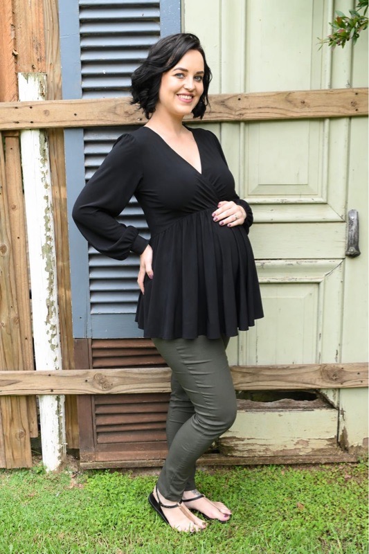Black long sleeve maternity and breastfeeding top with crossover neckline