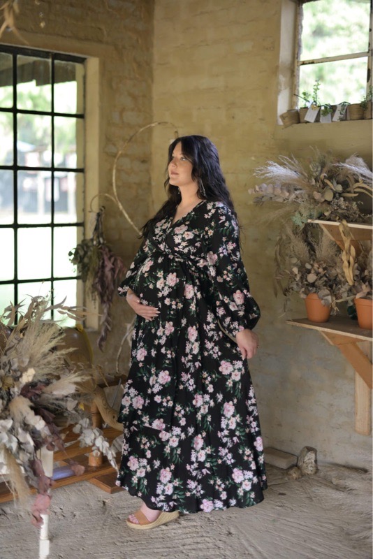 Black floral wrap maternity dress with frilly sleeves
