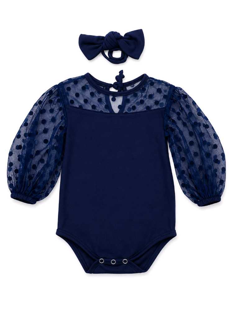 Navy baby romper with polka dot tulle yoke, puff sleeves and matching headband