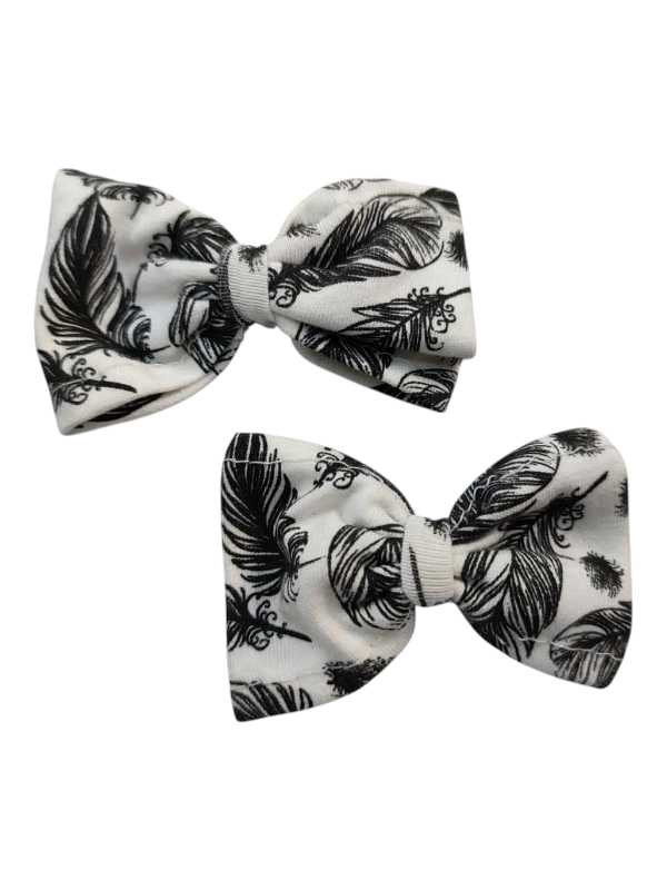 White and black feather hairclips