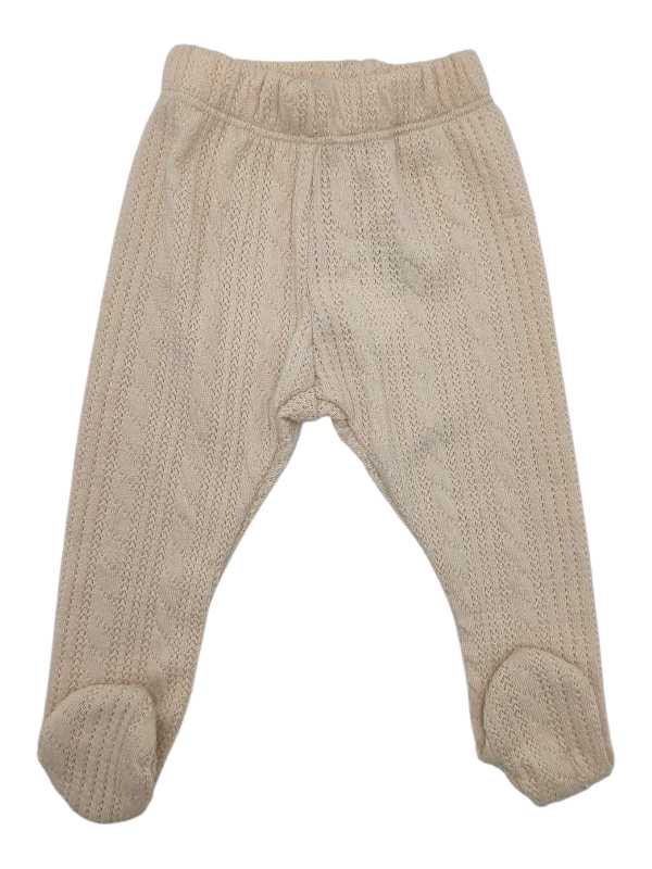 Knitted light beige footed baby leggings